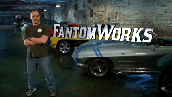 FantomWorks series poster. Dan Short stands in front of a row of classic cars