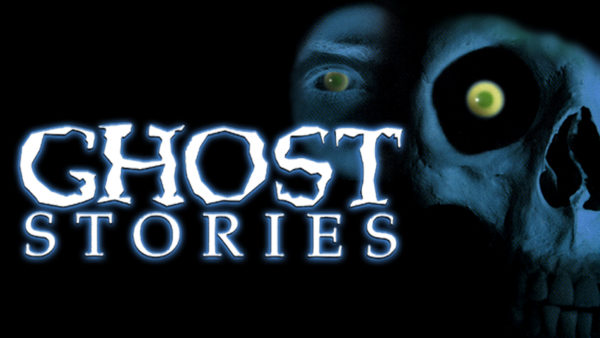 The words "Ghost Stories" appears over the top of a close up of a skeletal face and a human face
